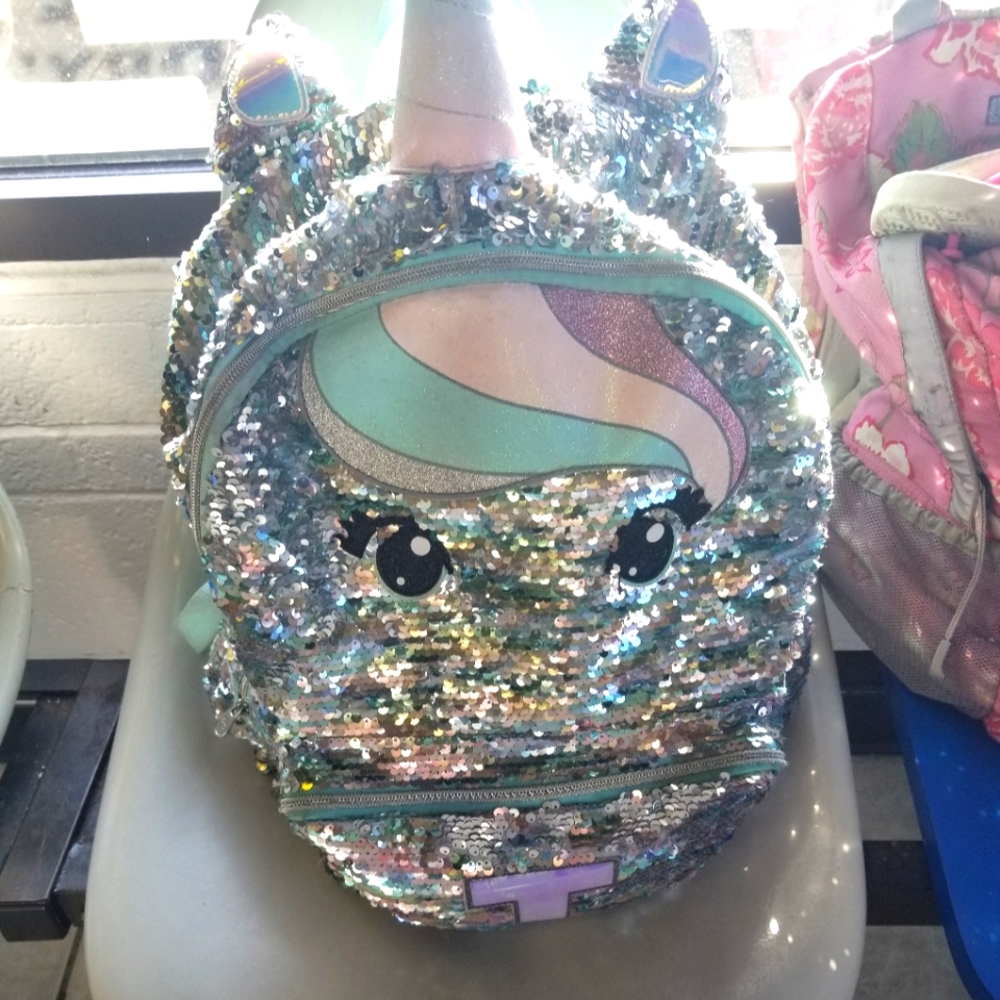 Unicorn justice backpack letter T